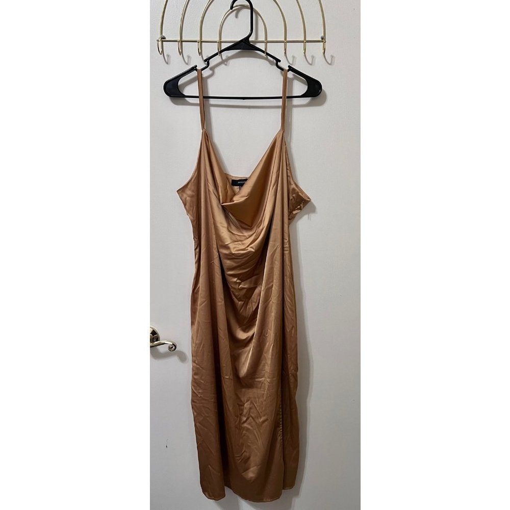 slip dress Gold slip dress. Brand: forever 21. Size 3x. Never worn before - wrin